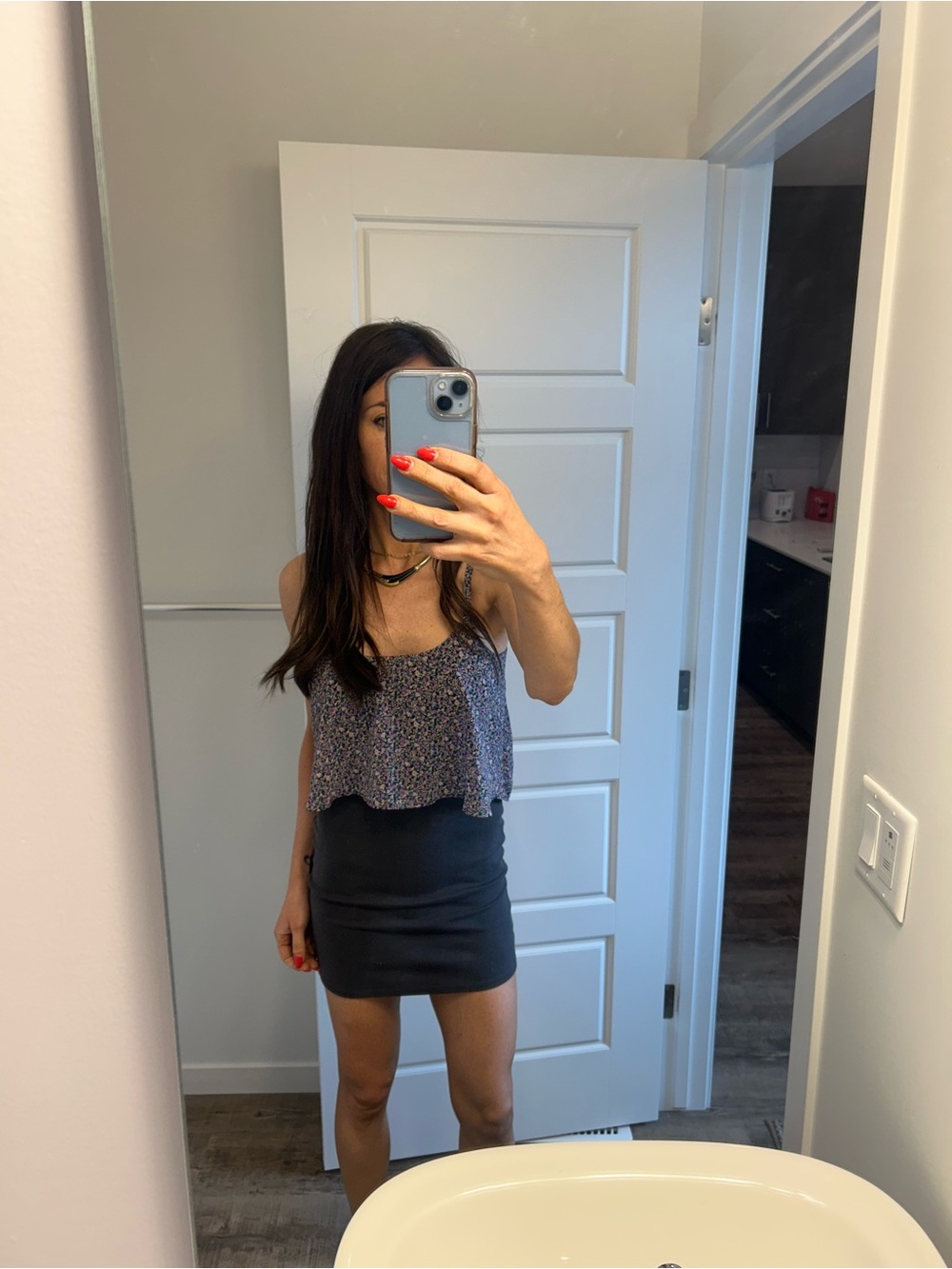 American Eagle Outfitters navy floral ruffle cami with black skirt